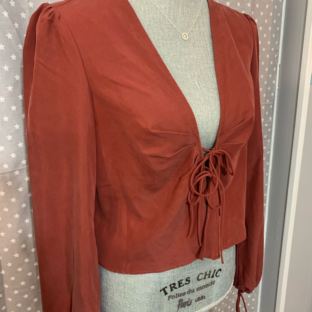 Burnt orange blouse from Urban Outfitters